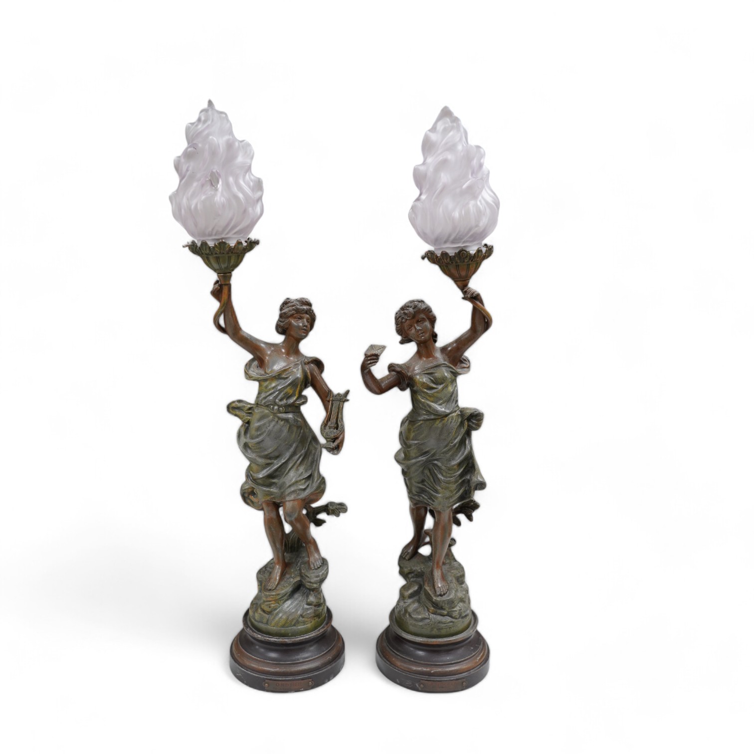 After Guillemin (1841-1907), a pair of spelter figural lamps with frosted glass shades, overall 61cm high. Condition - poor to fair, damage to glass